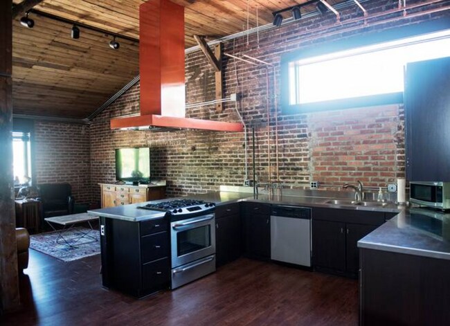 View into Living Space from Large, Light filled Kitchen. - 693 W North St Unit #2