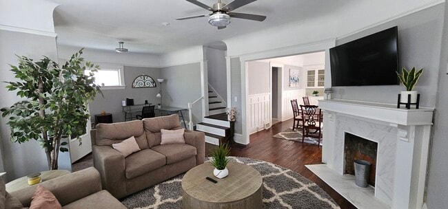 Open living room, sitting room or office and dining room - 10605 Ashbury Ave