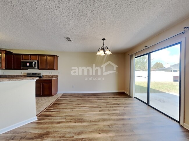 Photo - 7344 Rapid River Dr E