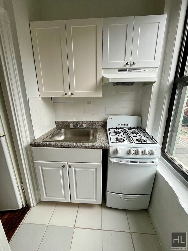 Photo - East 58TH ST Unidad A12