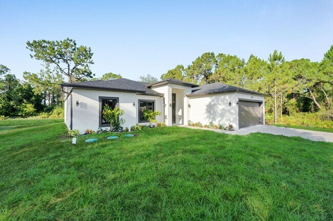 Photo - Brand-New Home in Lehigh Acres – Move-In Ready! FL 33974. Qualify for a deposit-free option and s...