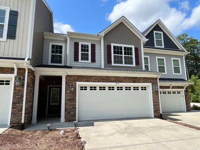 Photo - Exceptional 4BD, 2.5BA Cary Townhome with 2-Car Garage, Bonus 2nd Floor Living Space, and Private...