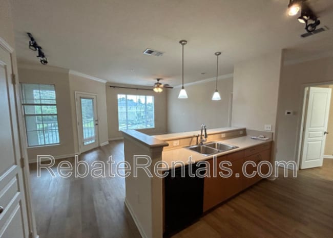 Building Photo - 8290 Gate Pkwy W Unit 617