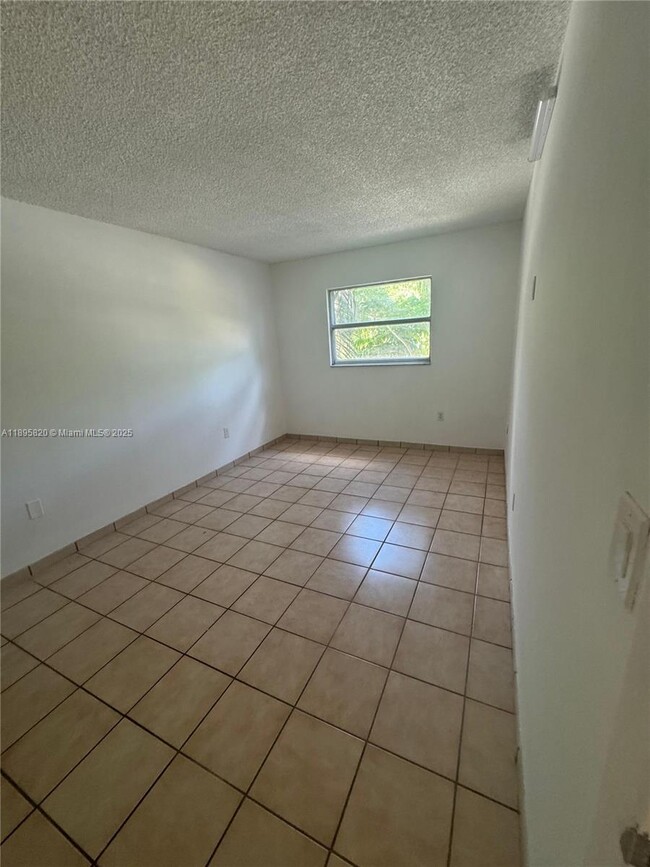 Photo - 4265 NW S Tamiami Canal Dr Unit 1-214