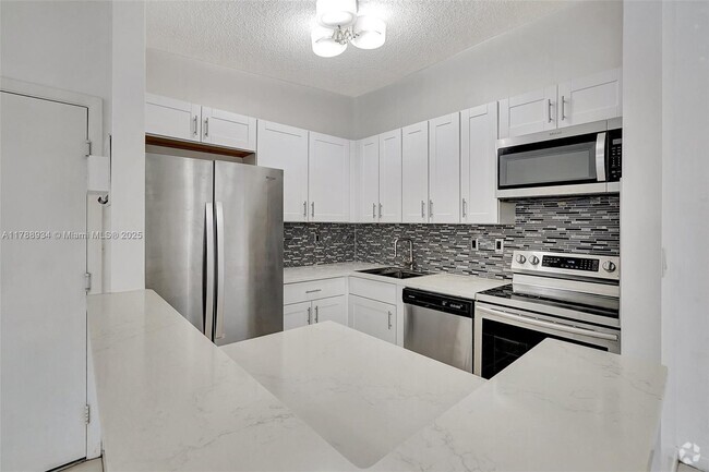 Building Photo - 825 NE 199th St Unit 204-13 Rental