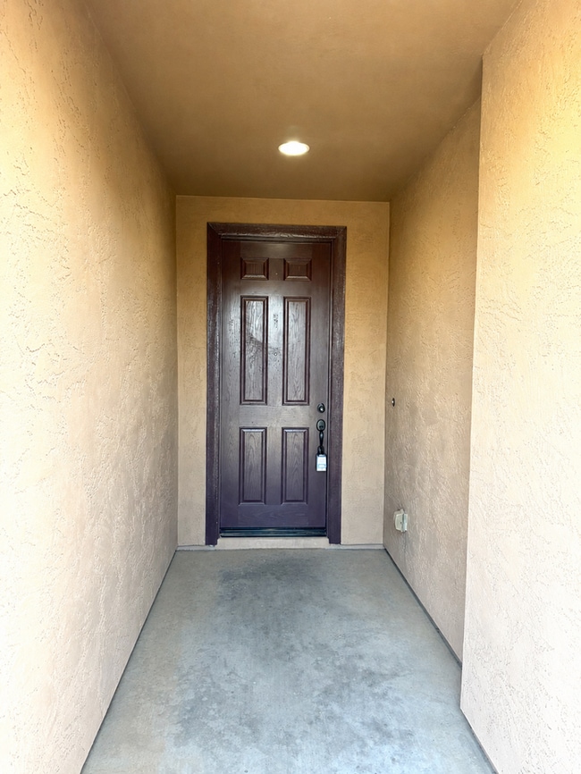 Beautiful 4BR/3BA single-story home in Harvest Queen Creek! Built in 2021 with 2,306 SF, den, che...