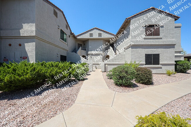 Building Photo - 9555 E Raintree Dr Rental