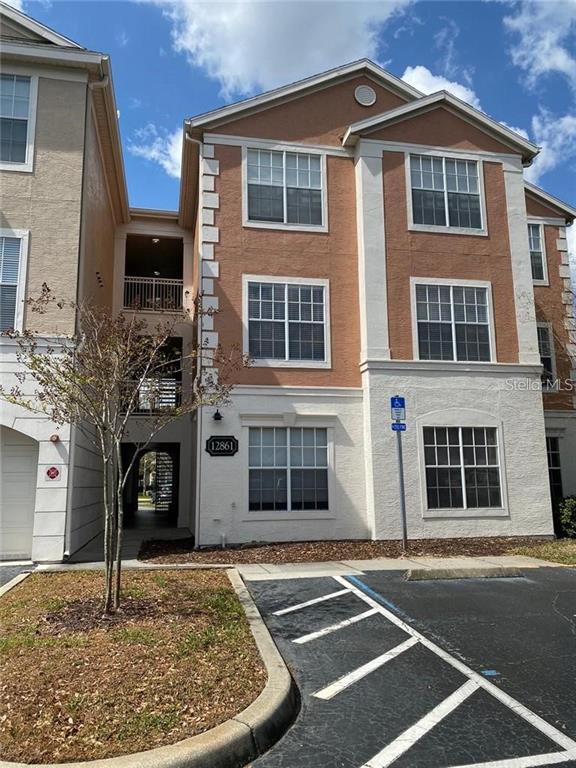 Building Photo - 12861 Madison Pointe Cir Unit 207