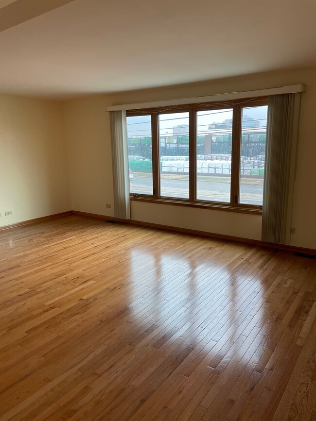 Living Room - 8839 N Greenwood Ave Apartments Unit #1