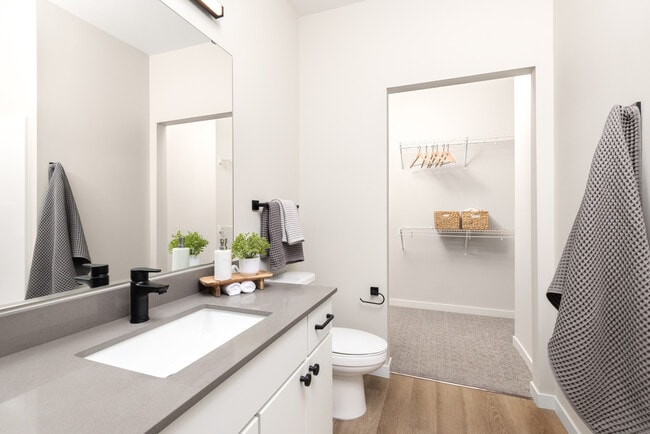 Bathroom with Walk-In Closets