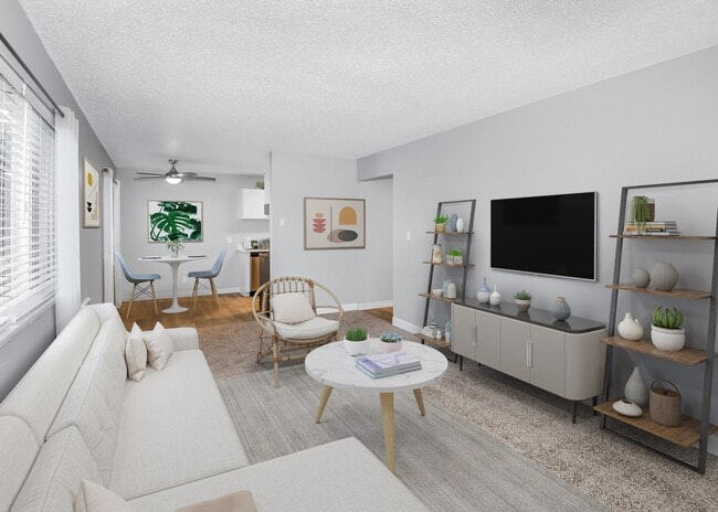 Cozy living room with carpet and dining nook