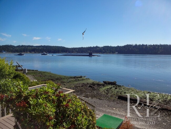 Building Photo - Waterfront Bliss: Stunning Puget Sound Views & Your Own Private Beach!