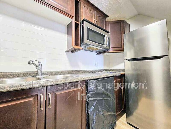 Photo - 10502-10100 100 Ave