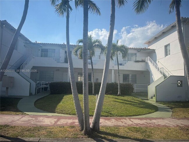 Building Photo - 7130 Rue Versailles Dr Unit 10