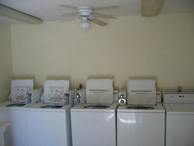 Laundry Room - Heritage House Apartments