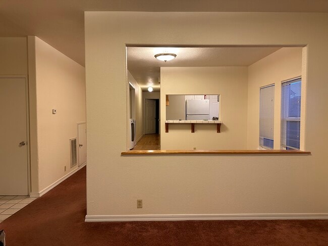 View from living room into dining room - 551 59th St Unit #B