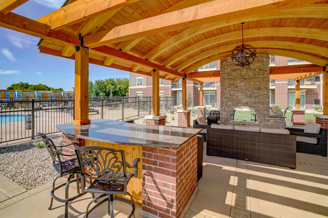 Pergola with Bar and Fire Table - The Abbey Apartments