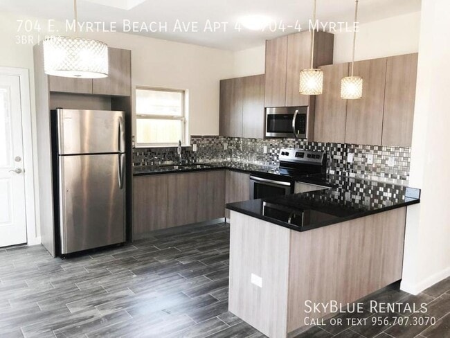 Building Photo - 704 E Myrtle Beach Ave Unit 704-4 Myrtle