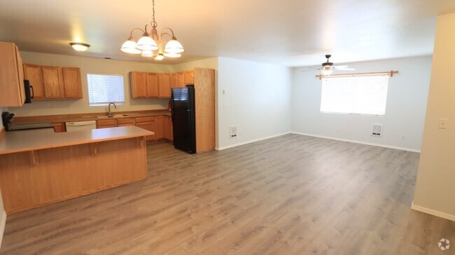 Building Photo - Recently updated 2/1.5 townhome next to th...