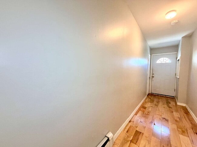 Photo - Move in July 1st • Spacious 1BR w/ Bonus Room Open Layout • Assigned Parking • Appliances • Garfield Unit B