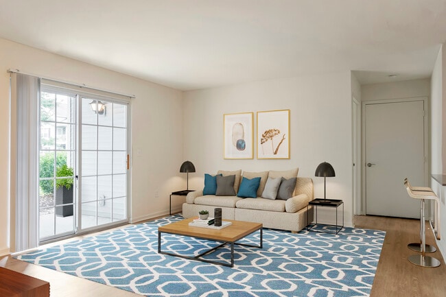 Renovated Package I living area with hard surface flooring