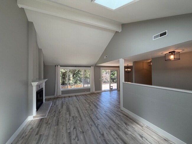 Photo - Spacious 4BR/3BA Home with Deck, Fenced Yard & Garage