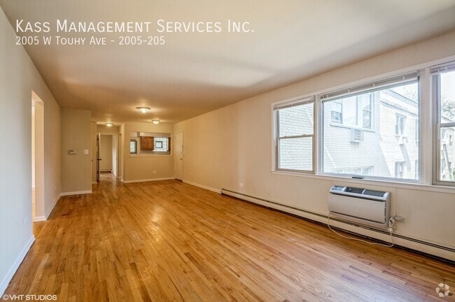 Building Photo - 2005 W Touhy Ave Unit 2005-205 Rental
