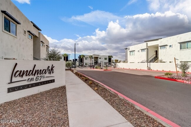 Building Photo - 9160 N 67th Ave Unit 202