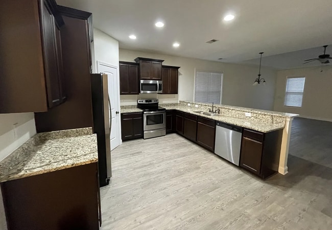 Photo - Charming Like-New 3BR Home with Fenced Yard & Easy Commute Near Fort Jackson