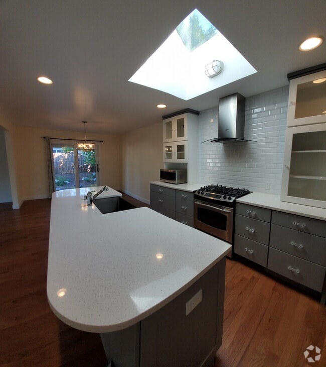 Kitchen with skylight and marble tops - 8120 Kitamat Way Rental