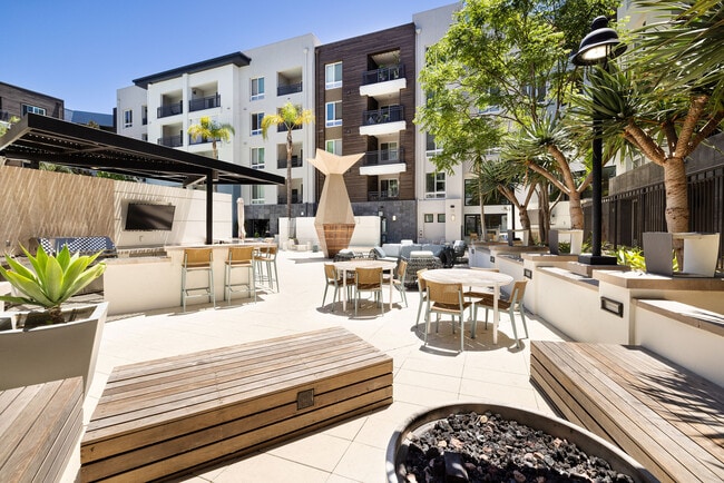 Outdoor Seating Area and Pool Deck | Elan Huntington Beach | Apartments in Huntington Beach, CA