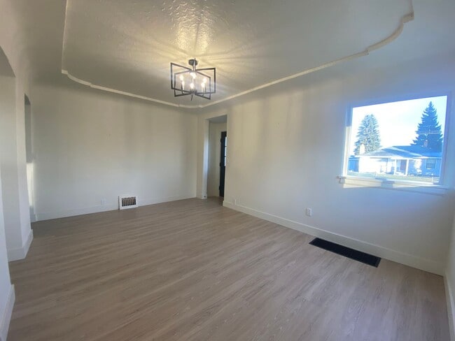 Photo - Move in special ONE month free – Spacious 4-Bedroom, 2-Bath Home in Spokane Valley