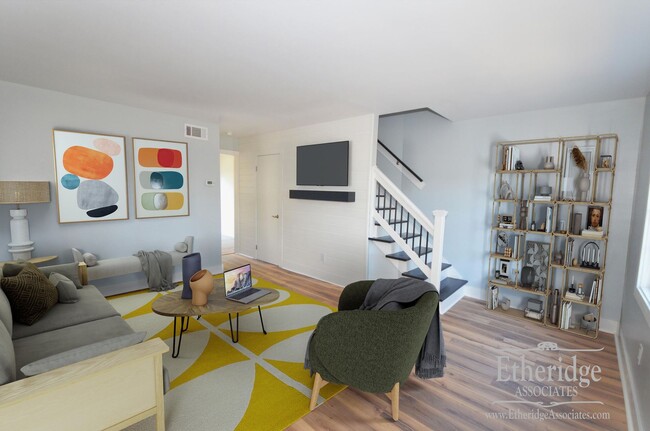 Building Photo - 2 Bed 1.5 Bath Townhome Apartment Unit B1