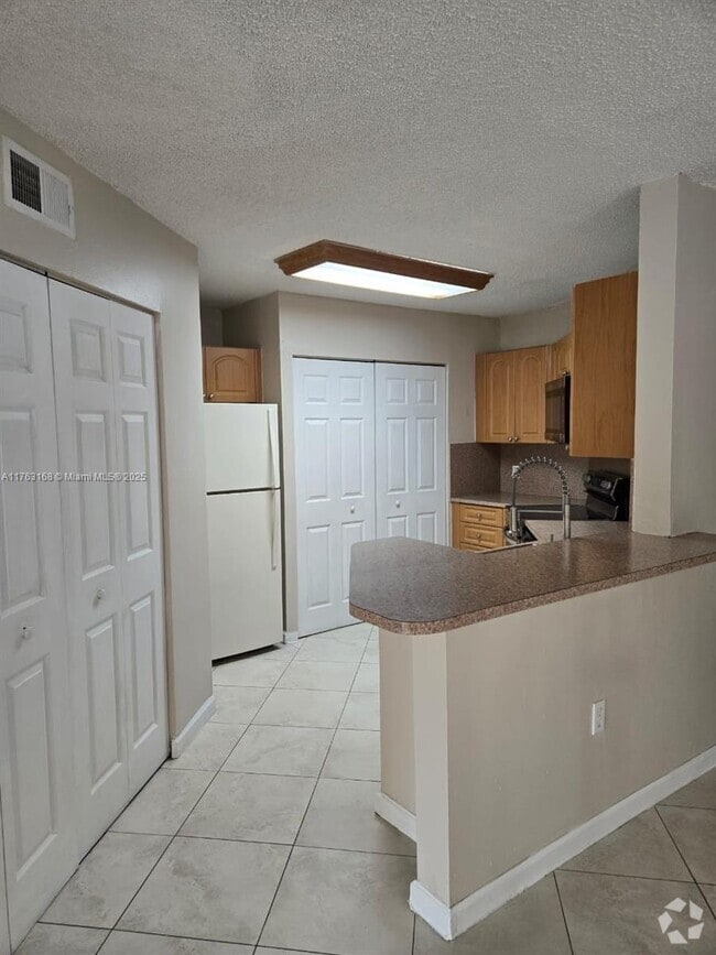 Building Photo - 6272 NW 186th St Unit 110 Rental