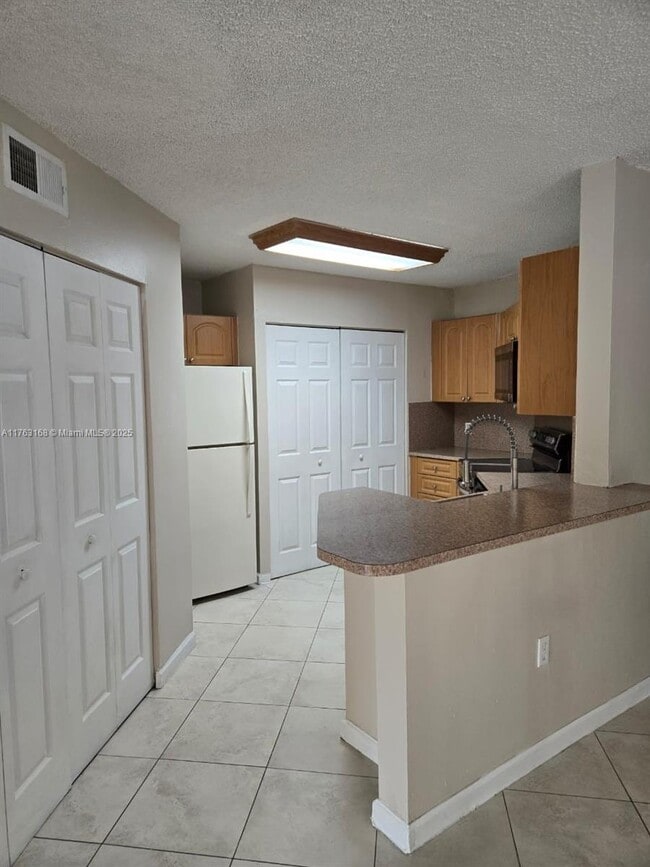 Photo - 6272 NW 186th St Condo Unit 110