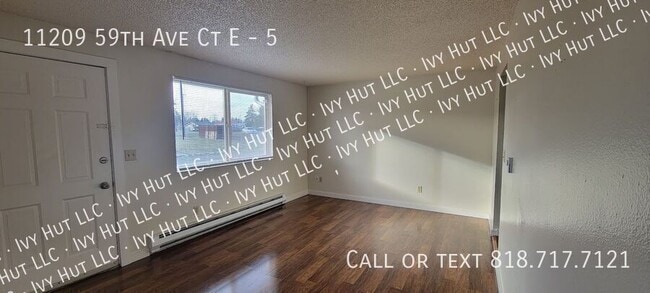 Building Photo - 11209 59th Ave Ct E Unit 5