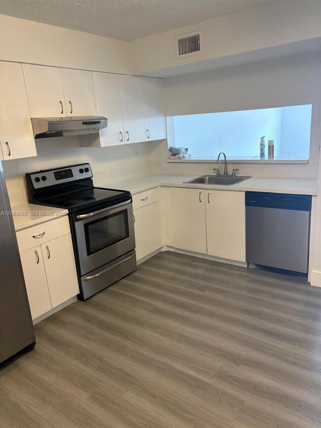 Building Photo - 14931 SW 82nd Terrace Unit 4-206