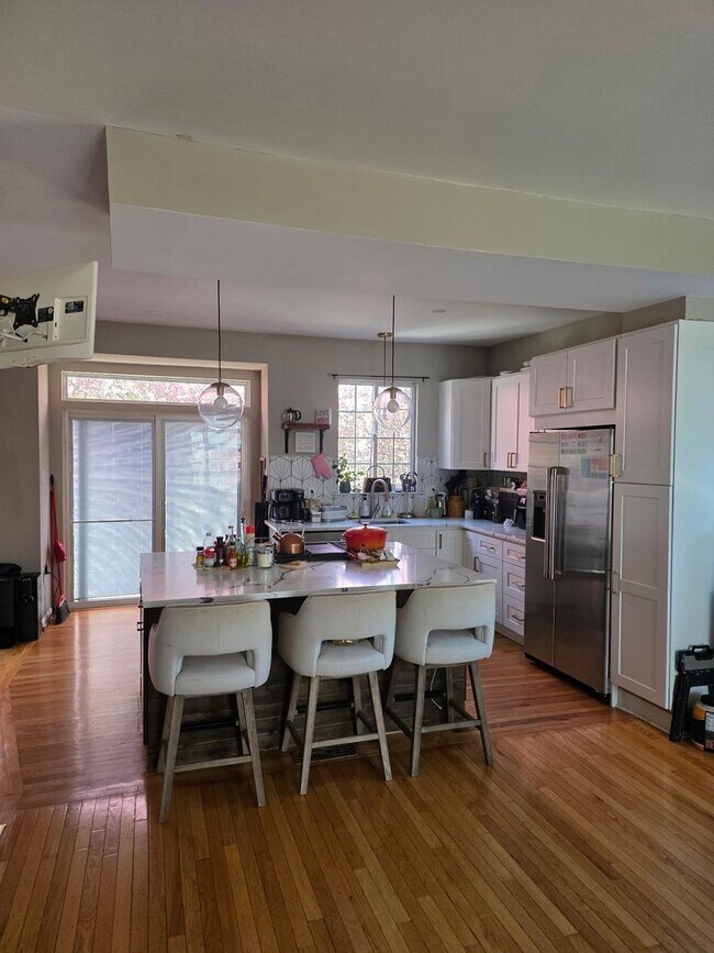 Photo - Stunning 3–4 Bedroom Townhome in Private Community | Garage + EV Charger | Deck with Tree Views