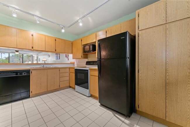 Building Photo - 2621 Village Blvd Unit 203