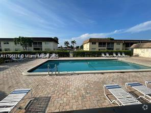 Building Photo - 9851 Sandalfoot Blvd Unit 208 Rental