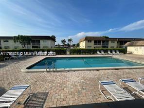 Photo - 9851 Sandalfoot Blvd Condo Unit 208