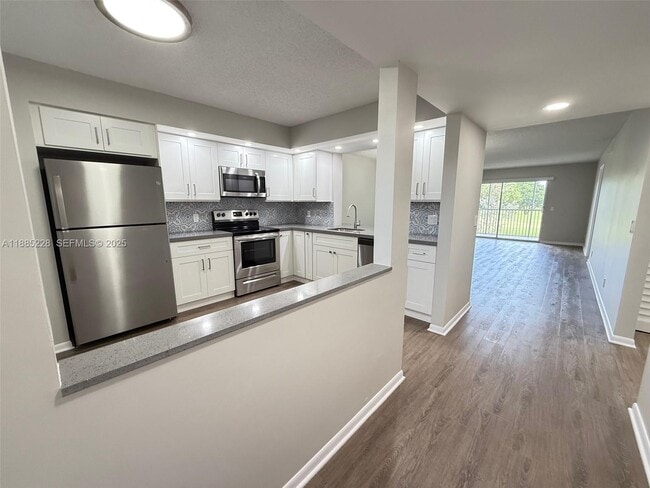 Building Photo - 901 SW 128th Ave Unit 208E