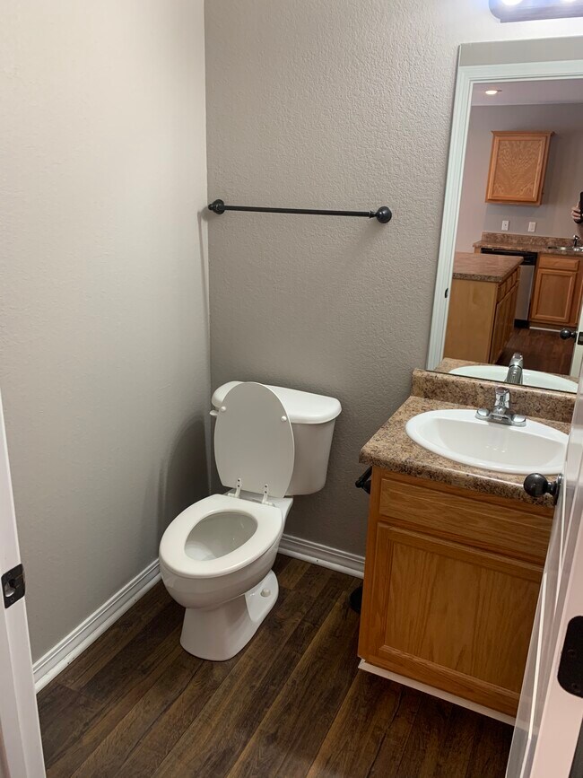 .5 bath in the living room area. - 2874 W Lakewood Dr