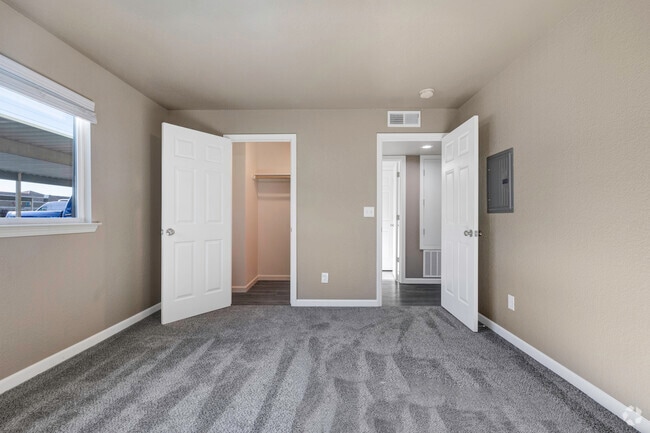 View of Bedroom towards closet and hallway