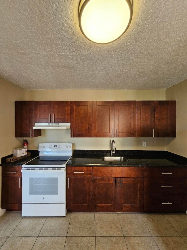 Building Photo - 1200 Blue Heron Blvd Unit 5