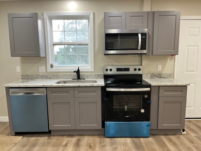 Soft close cabinets, new kitchen. - 2741 Jones Ave Apartments