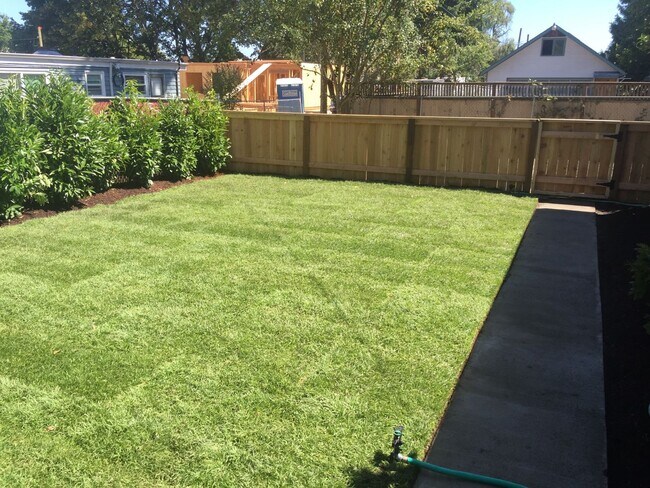 Photo - Crisp Duplex, offstreet parking, great backyard too. Unit 7641