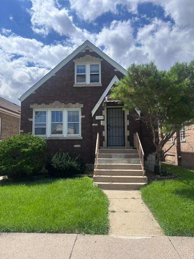 Building Photo - 6204 S McVicker Ave Unit 1R