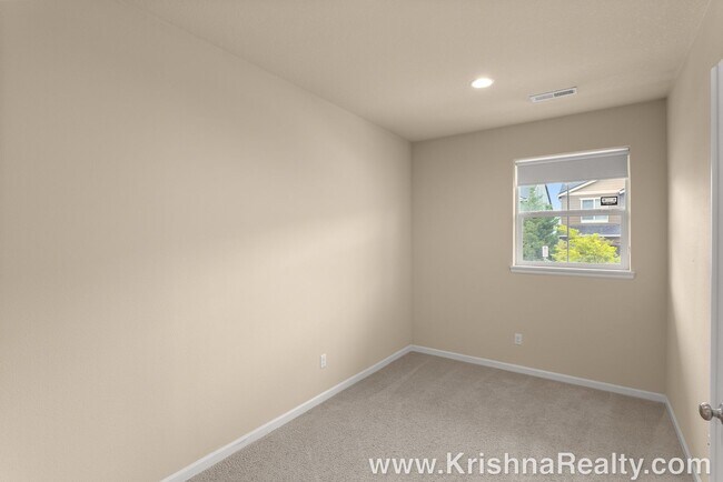 Photo - Spacious 4-Bedroom + Office Home in Abbey Creek – Modern Finishes, EV Charger & Low-Maintenance B...