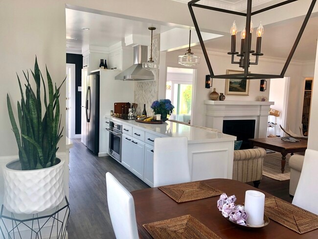 Kitchen opens to living room - 1741 Oak St House